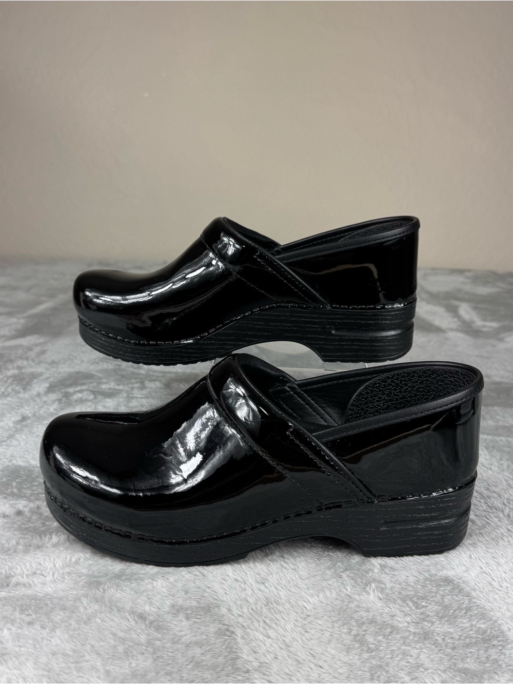 Dansko Professional Clogs in a high-gloss black patent leather finish sz 42